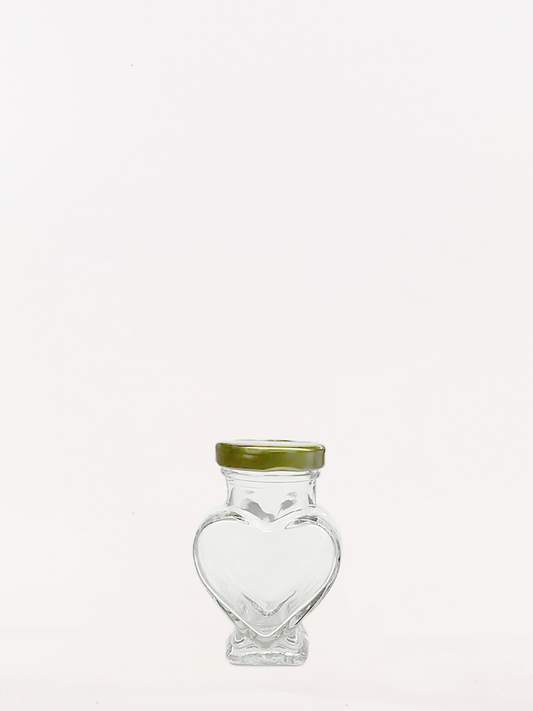 Heart shaped glass jar with gold lids